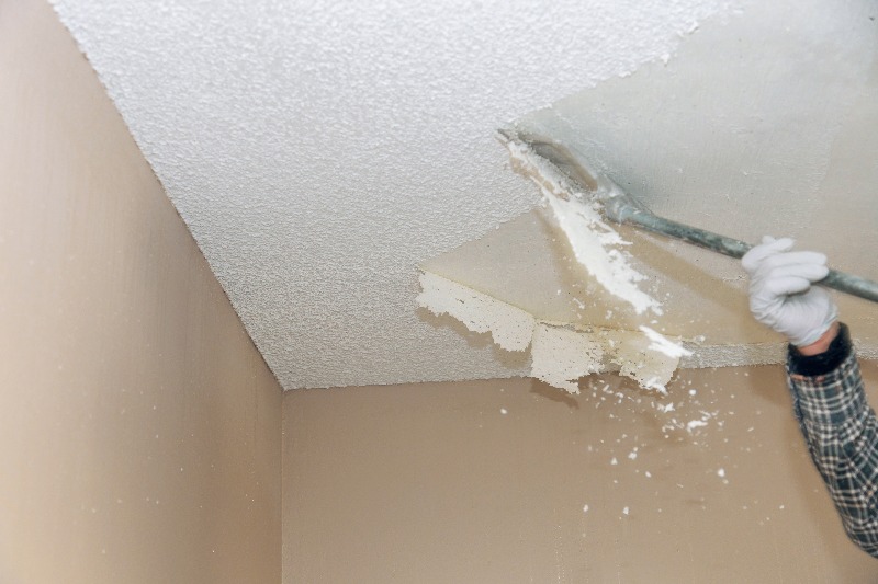 Removing an old popcorn ceiling.